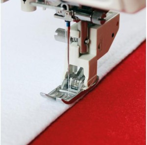 WĄSKA STOPKA Z GÓRNYM TRANSPORTEM JANOME (ROTACYJNY 9 MM)