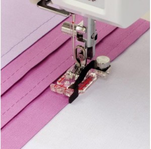 STOPKA Z PROWADNIKAMI JANOME 4 W 1 (ROTACYJNY 9 MM)